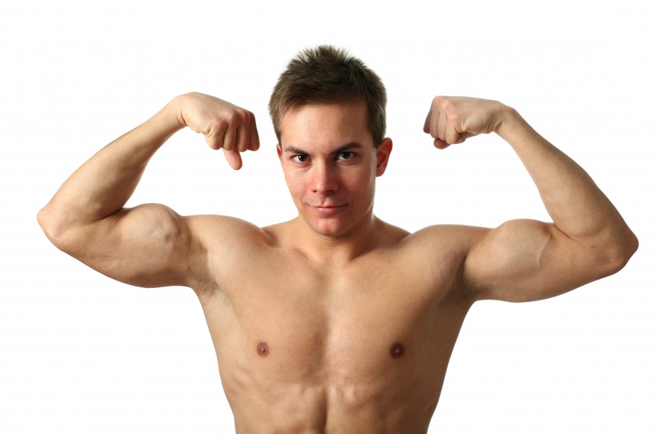 Young muscular man showing his biceps isolated on white